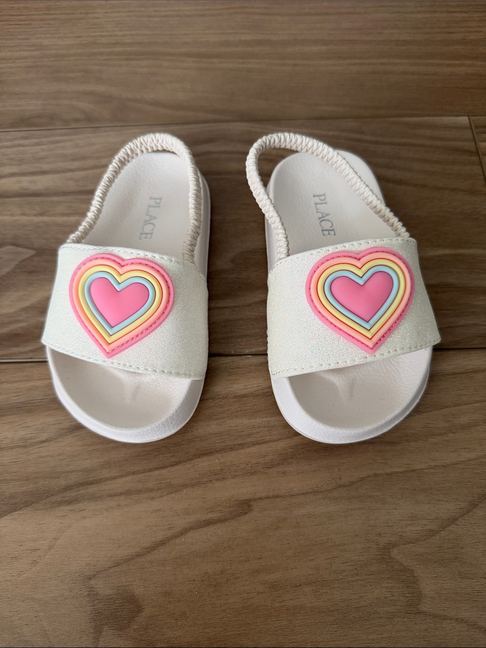 The Children's Place White Slide Sandals with Pink Rainbow Heart Accent